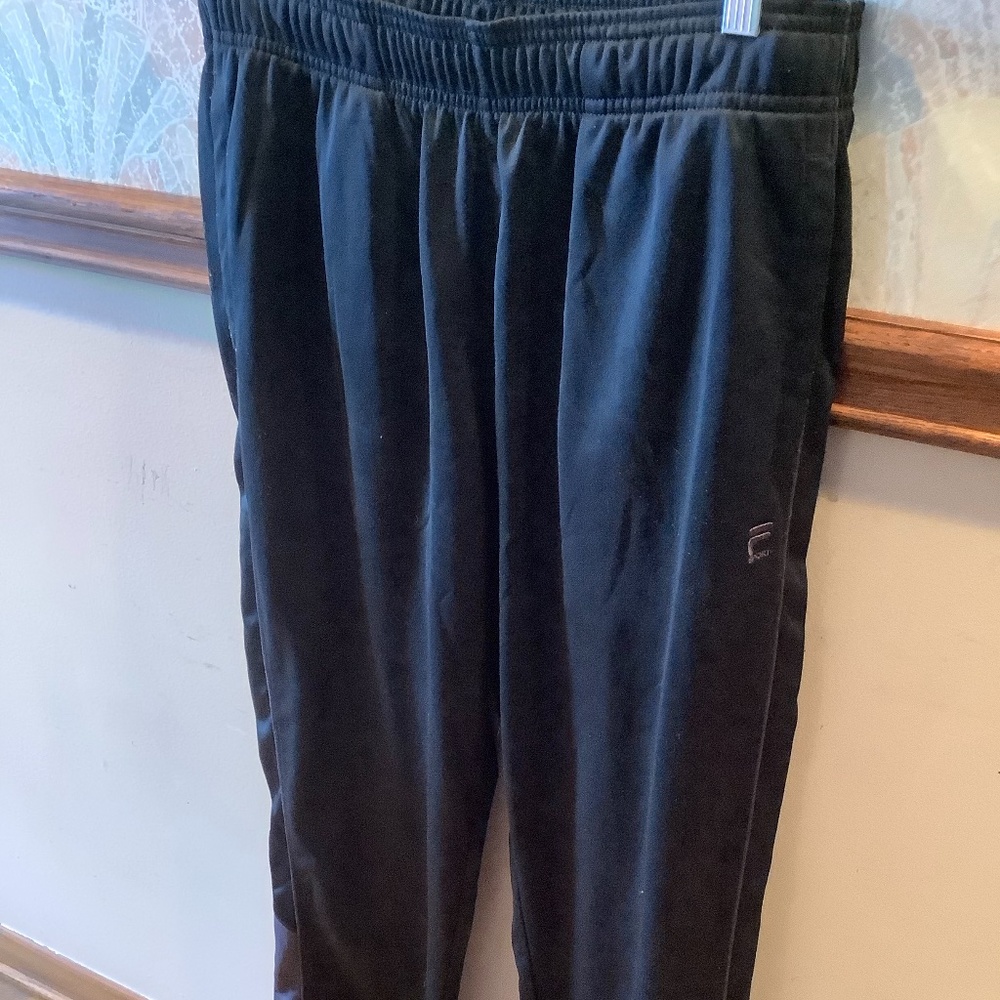 Men’s Fila sweatpants.